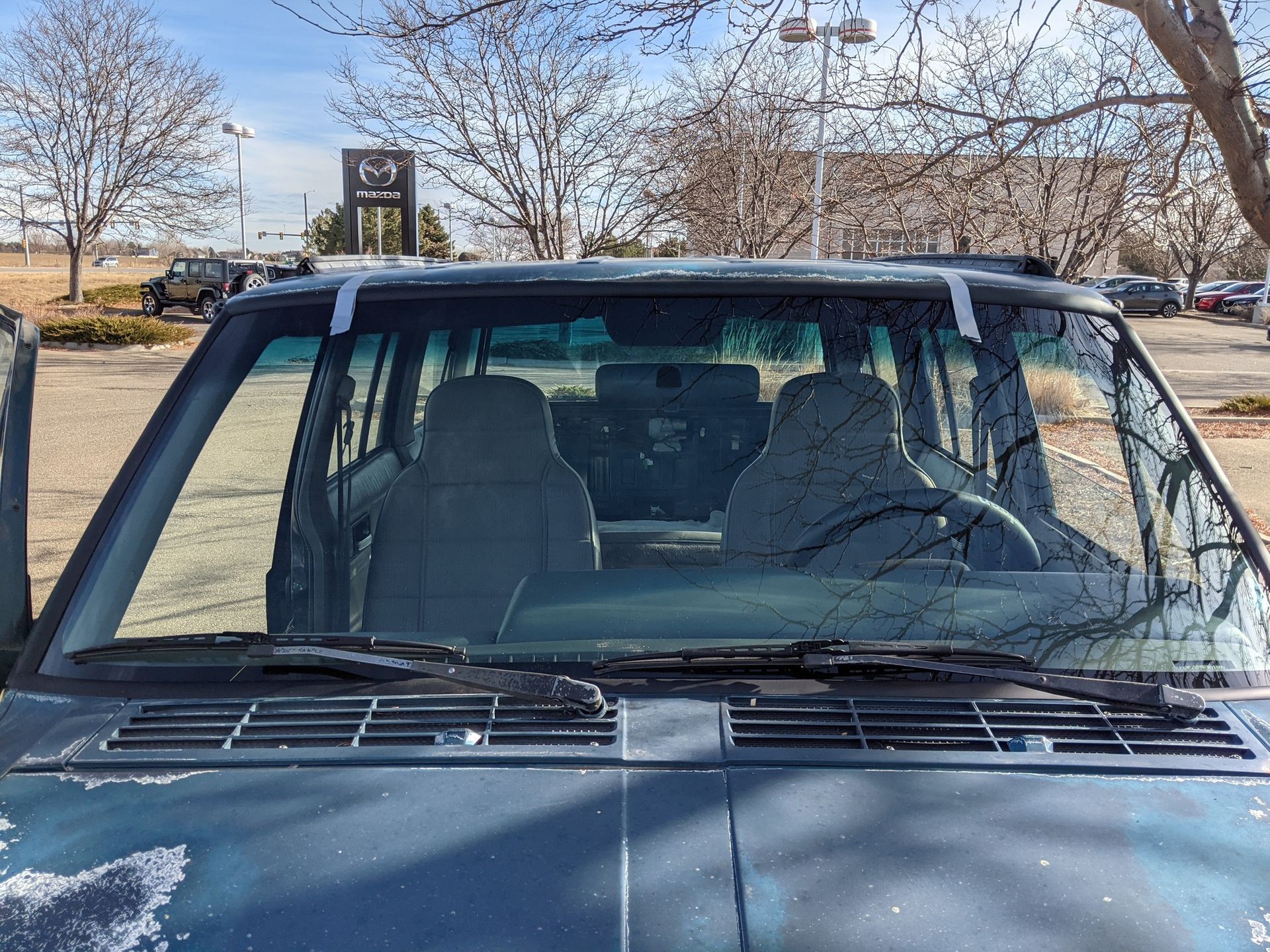Freshly replaced windshield on a classic pickup truck